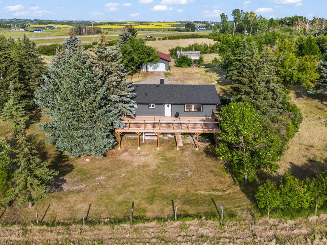 Property Photo: 290099 1016 Drive E AB T1S 1A2