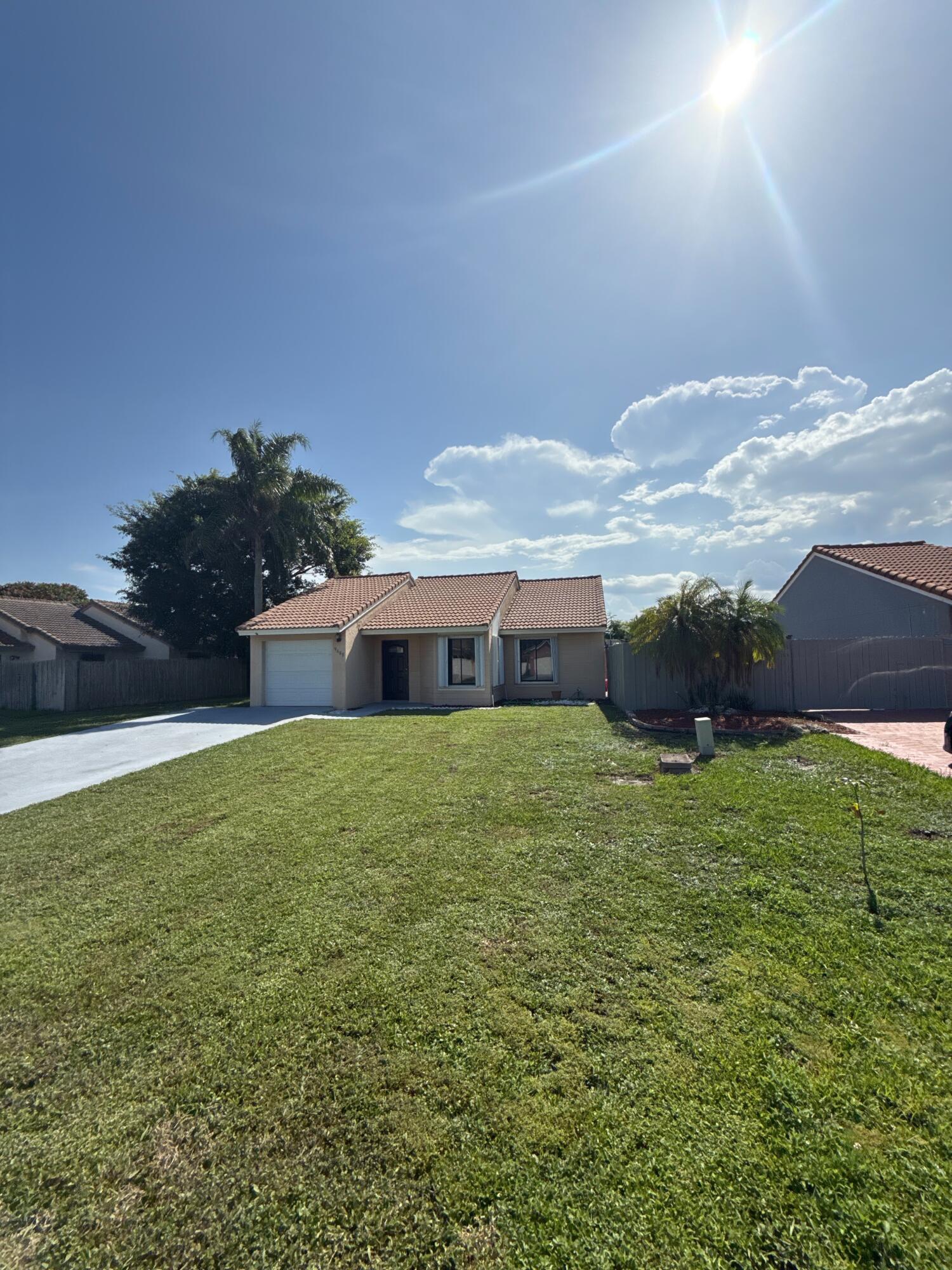 Property Photo:  9689 63rd Trail S  FL 33437 