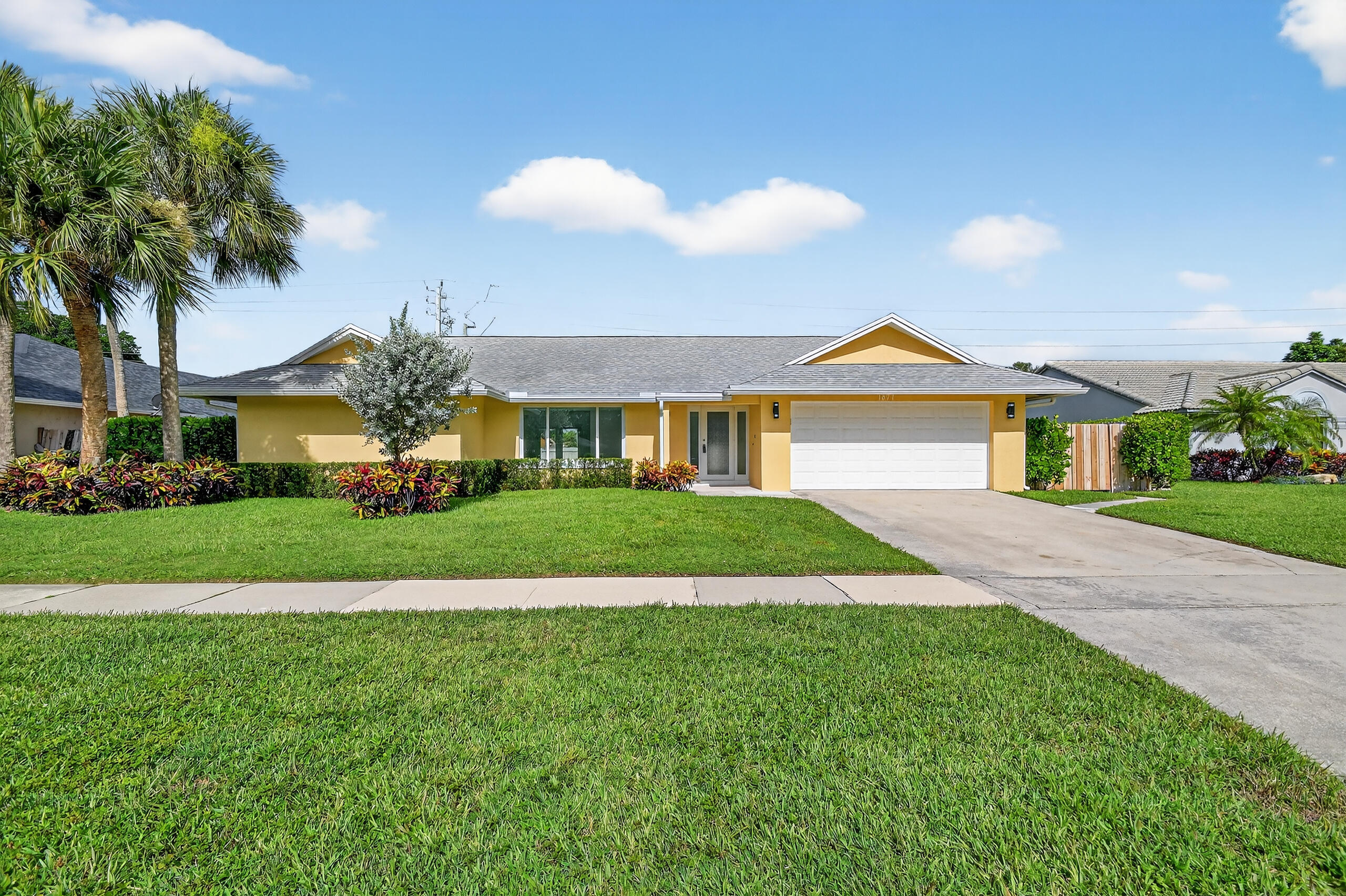 Property Photo:  1877 Shower Tree Way  FL 33414 