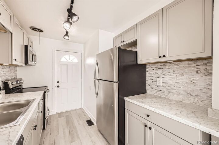 Property Photo:  1537 Xenia Street  CO 80220 