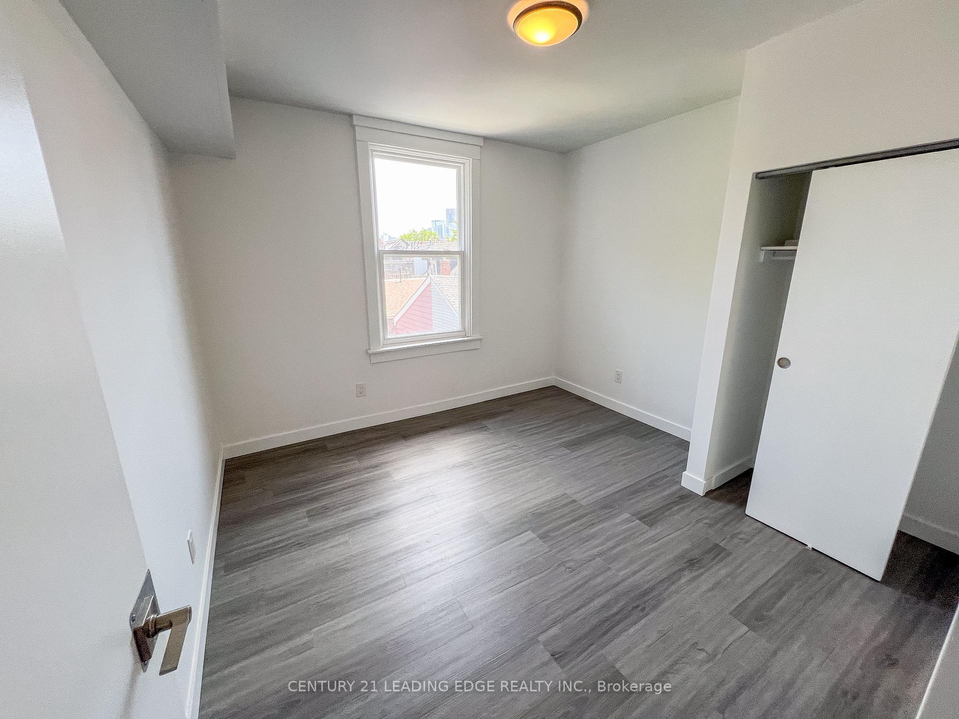Property Photo: 1A Leonard Avenue 1 ON M5T 2P8