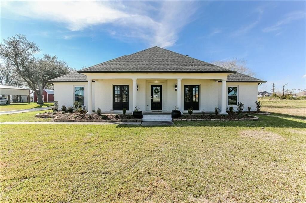 Property Photo: 7886 Lake Street LA 70605