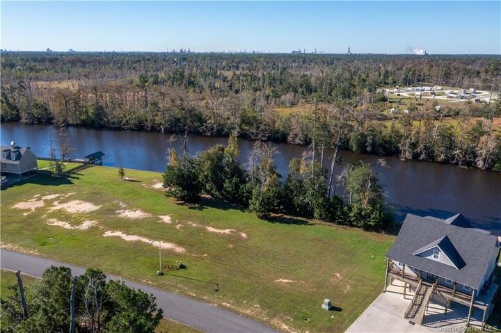 Property Photo:  3915 River Moss Lane  LA 70669 