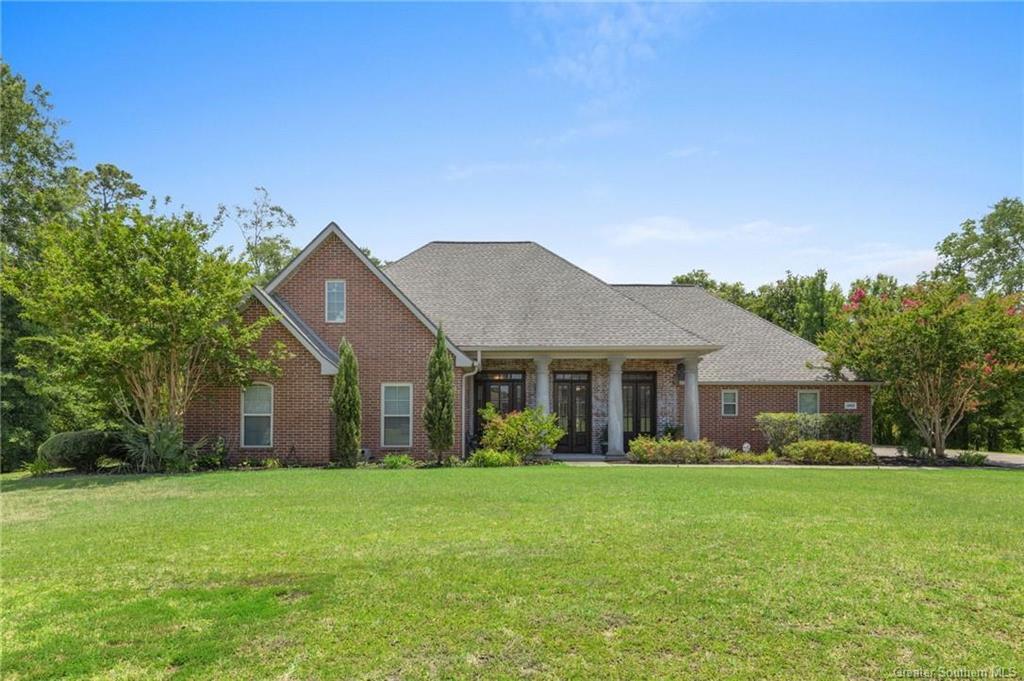 Property Photo: 1663 S Woodland Forest Drive S LA 70611