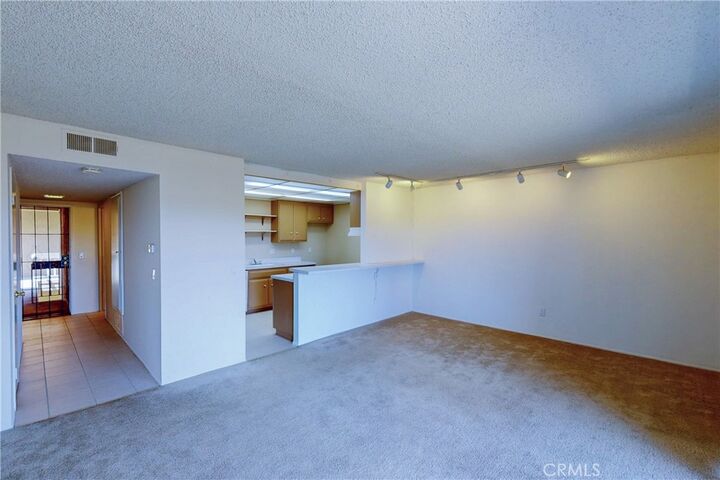 Property Photo:  6600 Warner Ave Unit 88  CA 92647