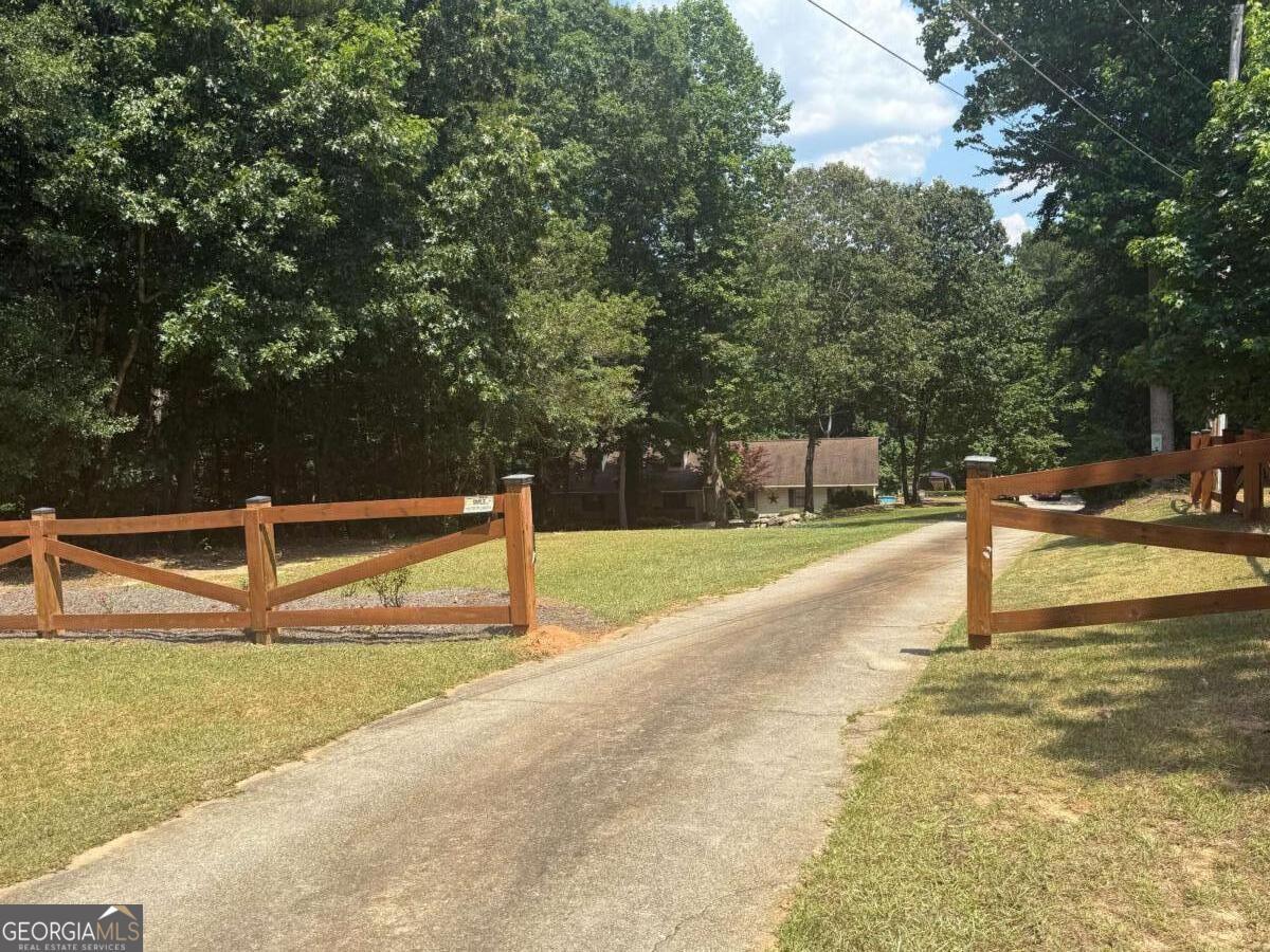 Property Photo:  5497 Highway 81  GA 30052 