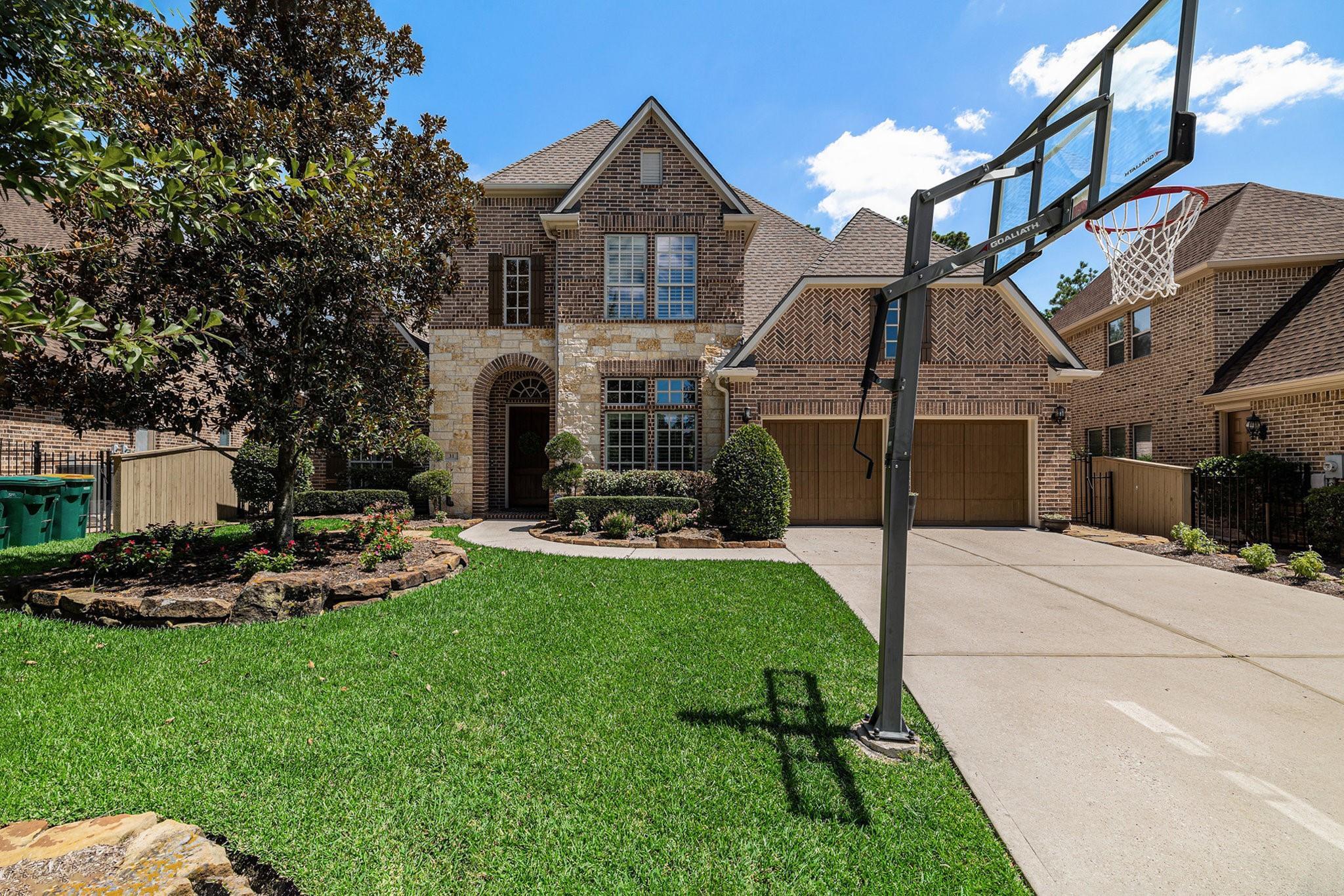 Property Photo:  31 Wood Manor Place  TX 77381 