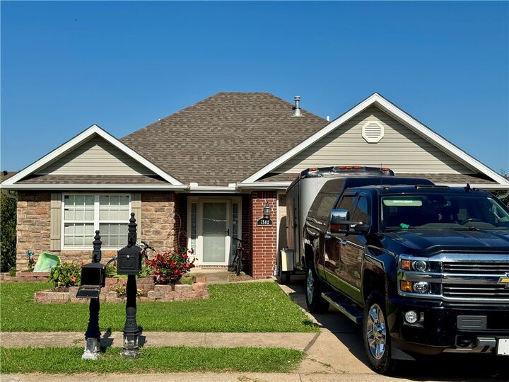 Property Photo:  1562 Hutchinson Street  AR 72751 