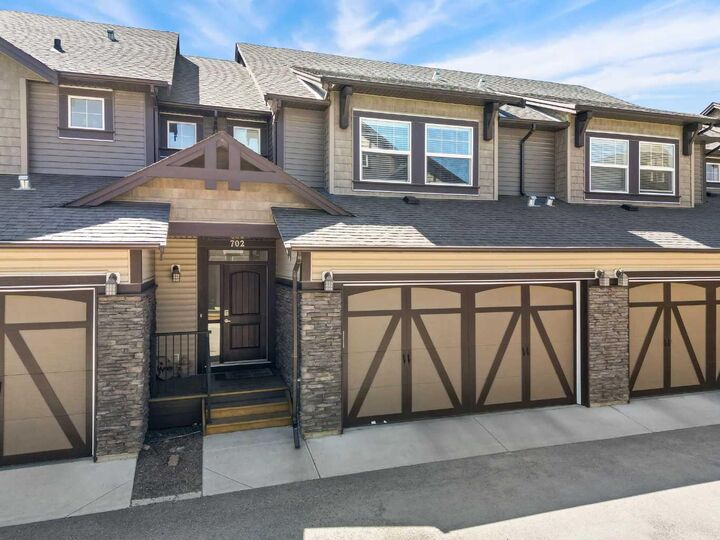 Property Photo:  110 Coopers Common SW 702  AB T4B 3Y3 