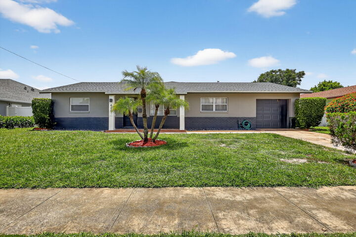 Property Photo:  600 S Mangonia Circle  FL 33401 