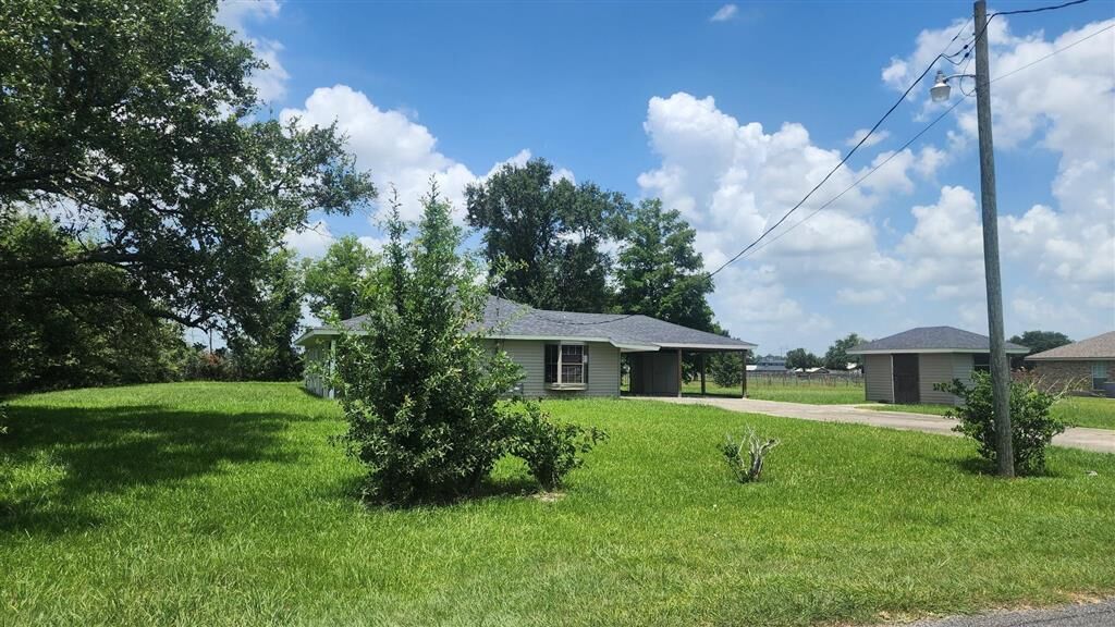 Property Photo:  6215 Tom Hebert Road  LA 70607 