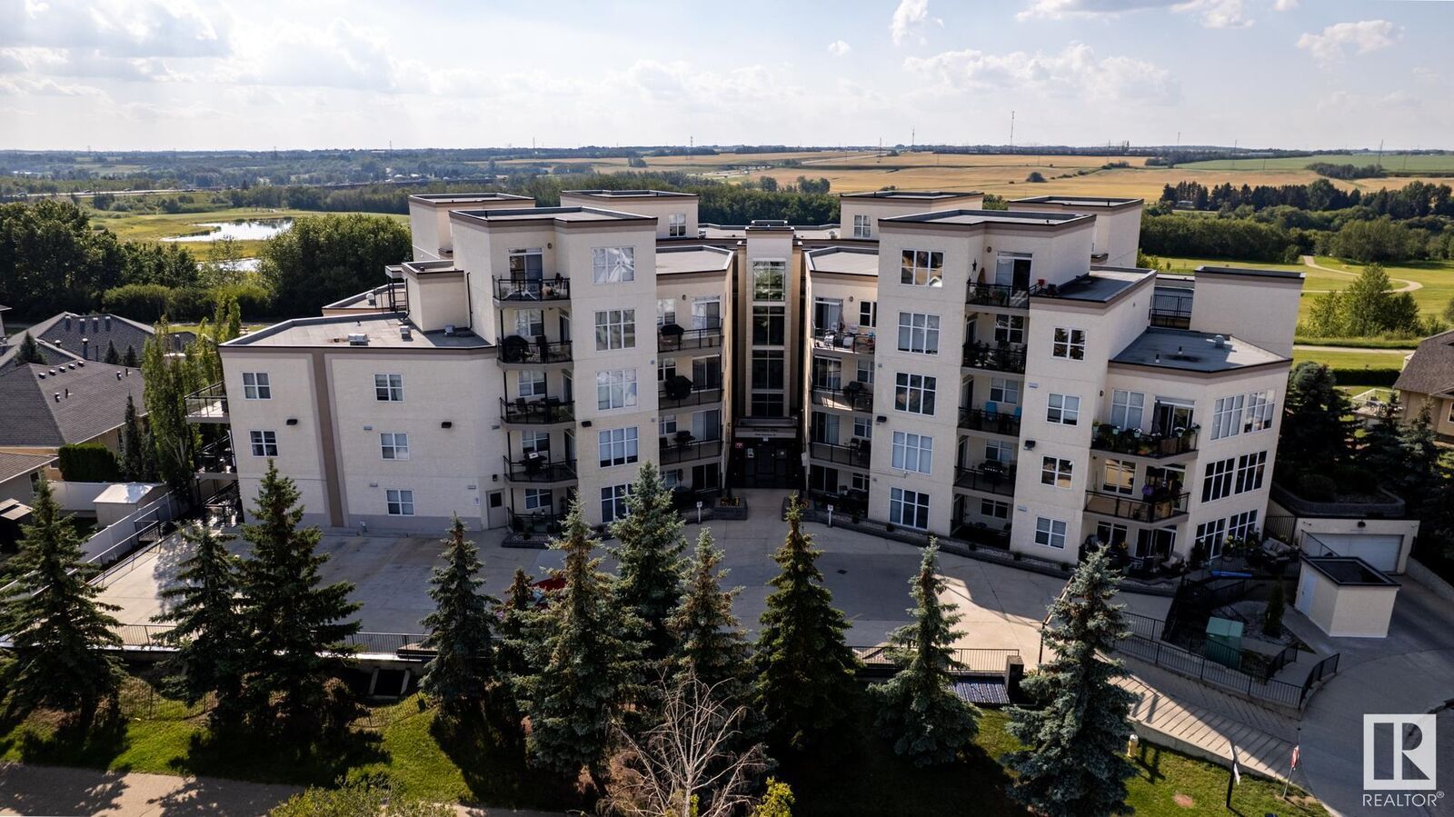 Property Photo: 9940 Sherridon Drive 300 AB T8L 4C9