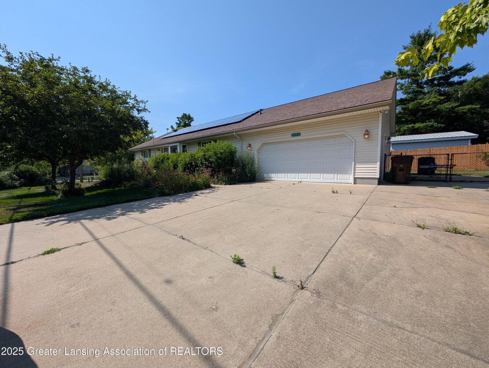 Property Photo:  100 W Madison Street  MI 48820 