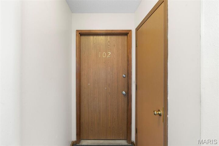 Property Photo: 11 Village West Court 102 MO 63090