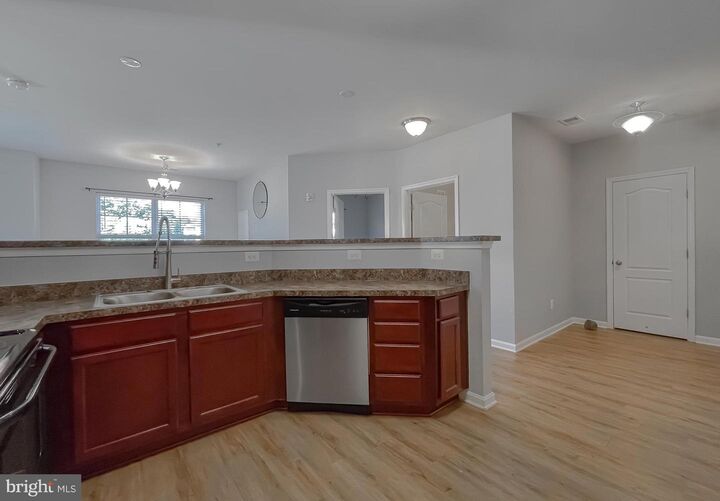 Property Photo:  23510 F D R Boulevard 207  MD 20619 