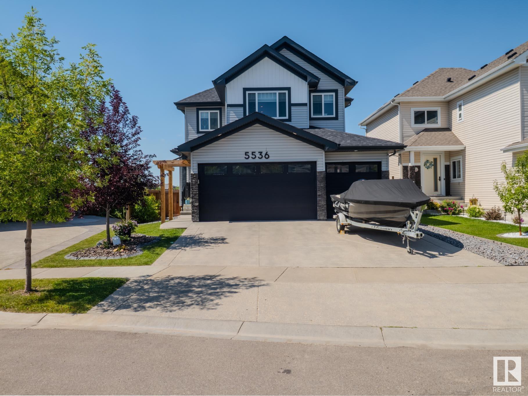 Property Photo: 5536 Poirier Way AB T4X 2B3