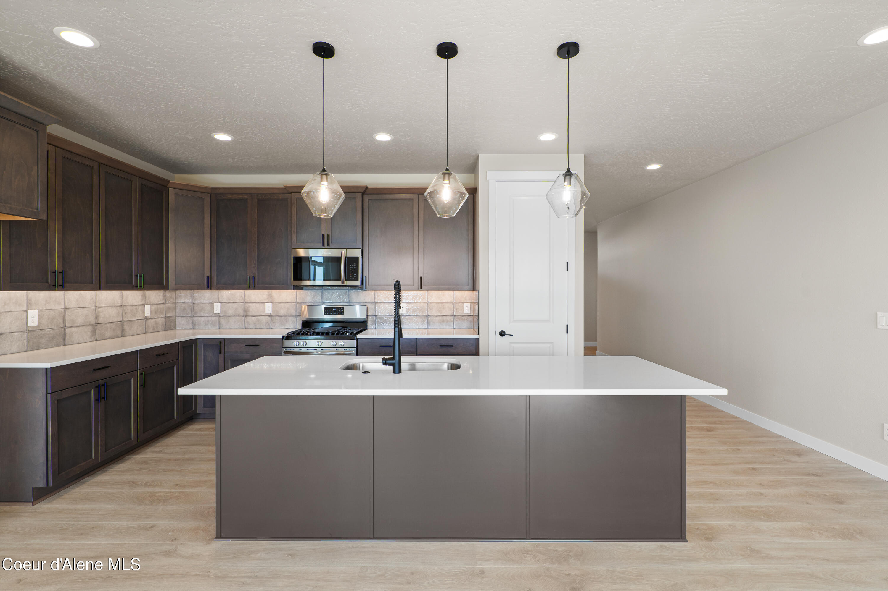 Property Photo: 6762 N Coeur Terre Blvd. ID 83814