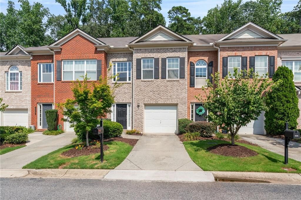 Property Photo:  1030 Firethorne Pass  GA 30040 