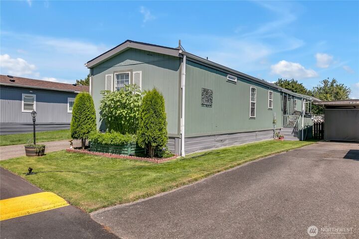 Property Photo:  909  205th Street Ct E 81  WA 98387 
