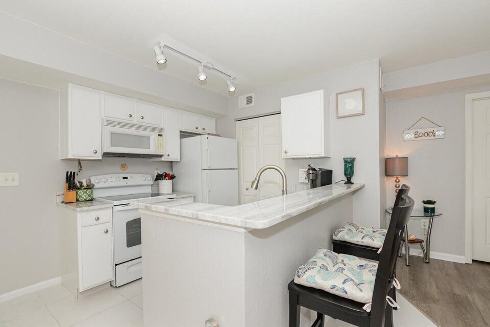 Property Photo: 141 SW Palm Drive 205 FL 34986