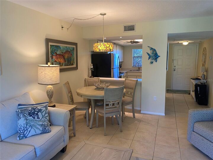 Property Photo: 104 Capri Isles Boulevard 108 FL 34292