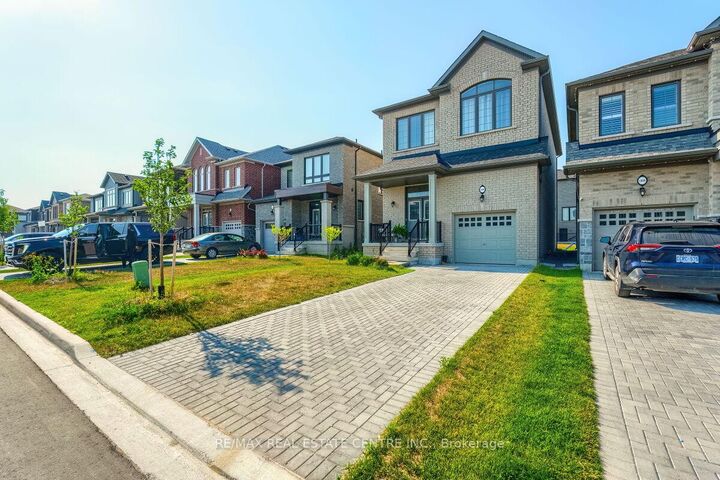 Property Photo: 1202 Rexton Drive ON L1L 0T4