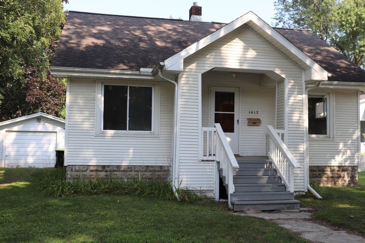 Property Photo:  1413 Mill Street  MI 48640 