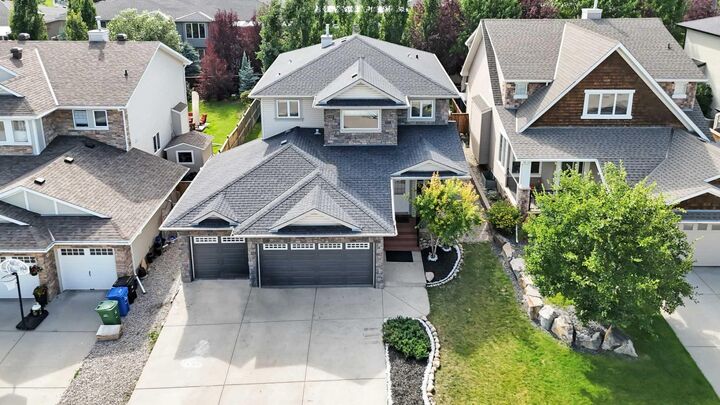 Photo de la propriété: 68 Elmont Court SW AB T3H 5Z8