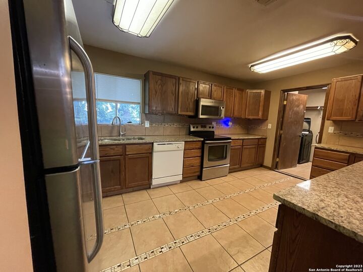 Property Photo: 7701 Cool Sands TX 78233