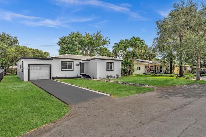Property Photo: 141 NW 89th St FL 33150