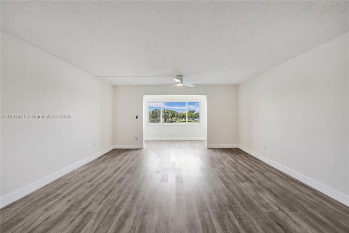 Property Photo:  873 NE 195th St 309  FL 33179 
