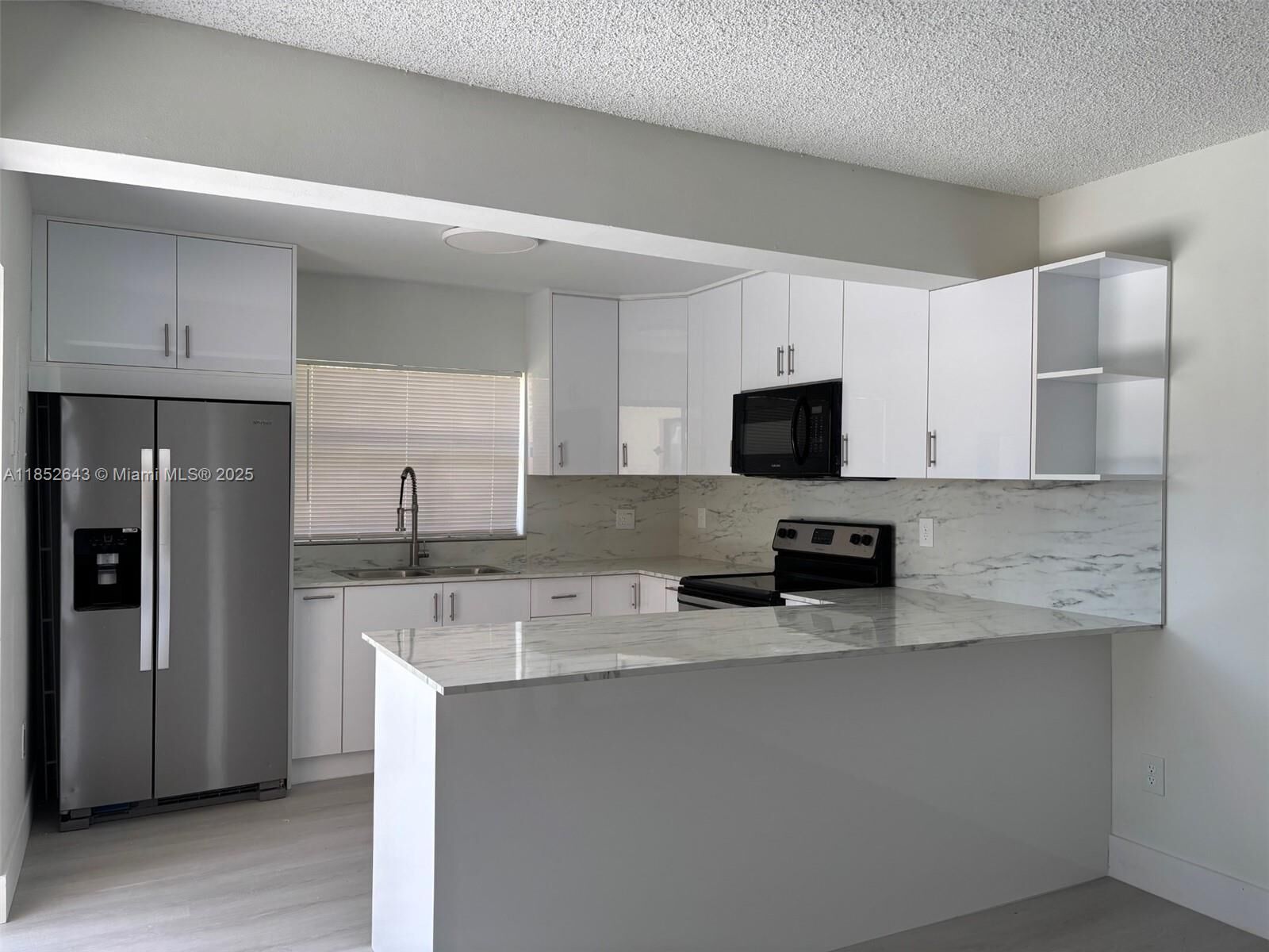 Property Photo:  6670 W 24th Ct 17-12  FL 33016