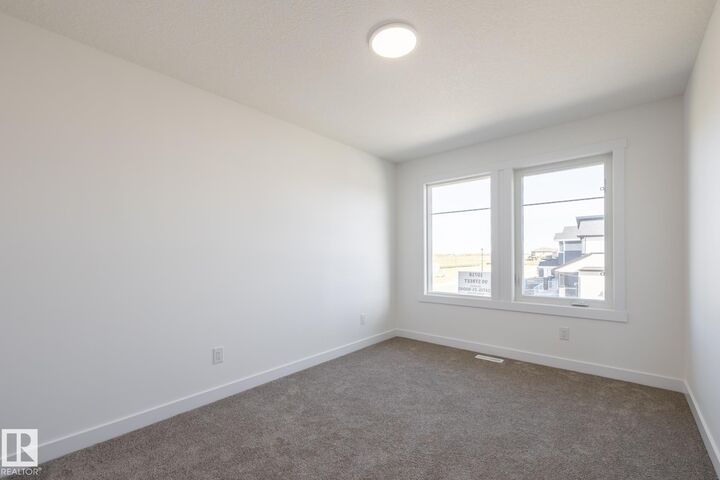 Property Photo: 10718 99 Street AB T8R 2R8