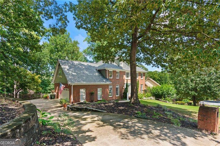 Property Photo: 3150 Arborwoods Drive GA 30022