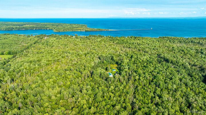Property Photo:  25649 Portage Entry Road  MI 49916 