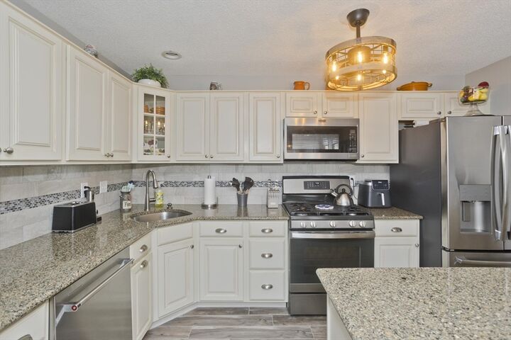 Property Photo:  104 Johnson Rd 1210  MA 01022 
