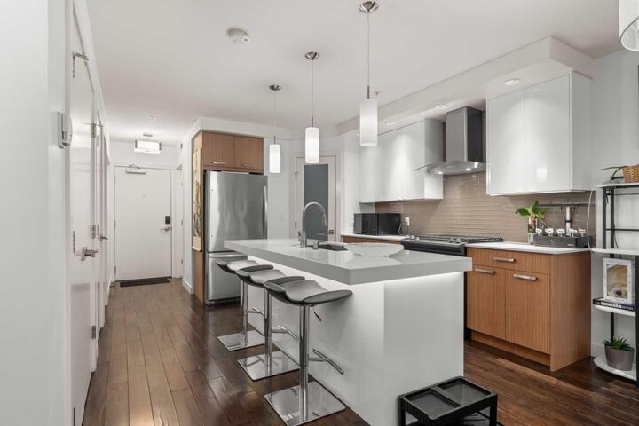 Property Photo:  1029 15 Avenue SW 302  AB T2R 0S5 