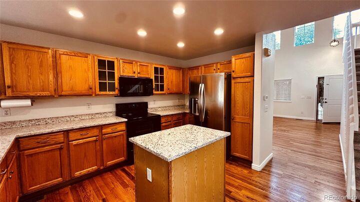 Property Photo:  1231 S Boston Court  CO 80247 
