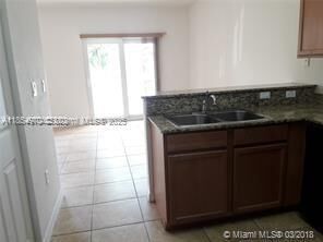 Property Photo: 8800 NW 107th Ct 212 FL 33178