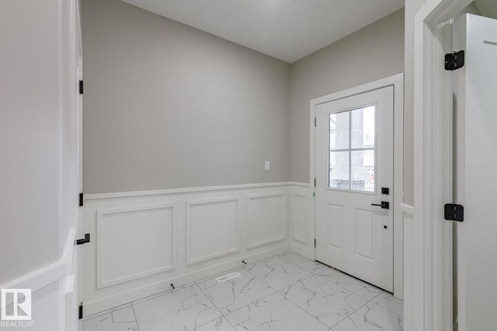Property Photo: 234 Kinglet Boulevard NW AB T5S 0S6