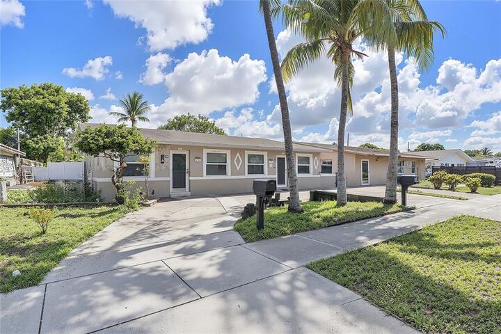 Property Photo: 112-116 NW 57th St FL 33309