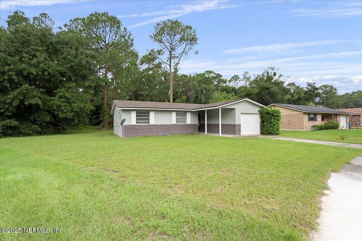 Property Photo:  10964 Bacall Road W  FL 32218