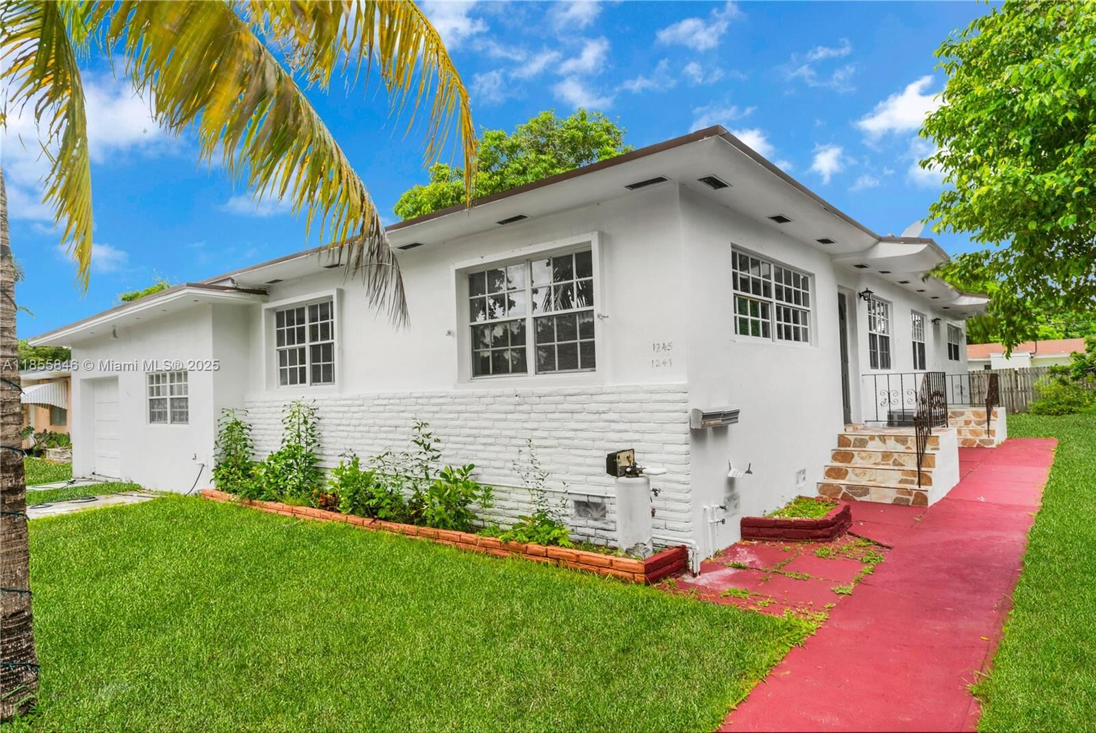 Property Photo: 1245 NE 117th St 1 FL 33161