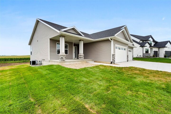 Property Photo:  305 Victory Lane  IA 52349 