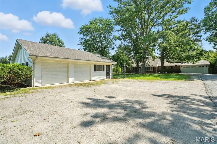 Property Photo:  6890 Christopher Drive  MO 63129 
