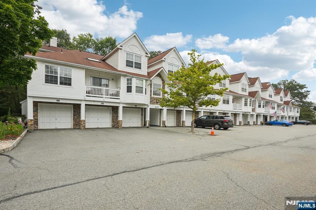 Property Photo:  66 E Whisper Way  NJ 07852 