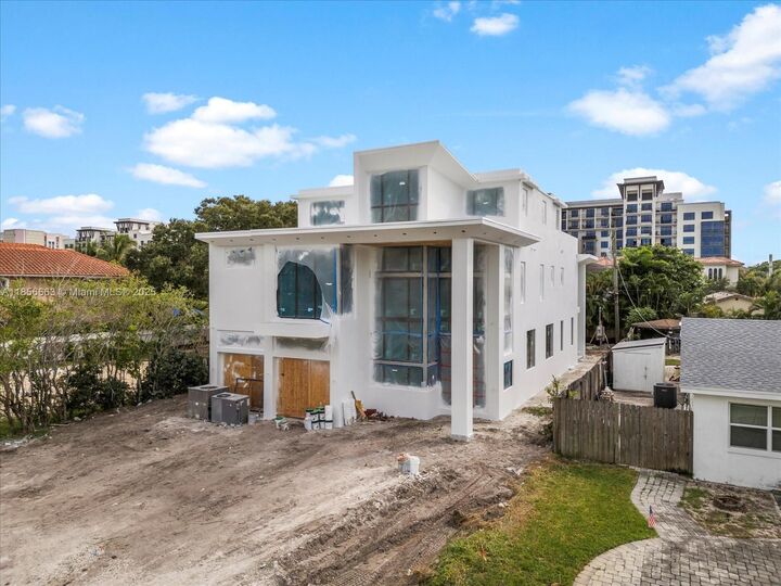 Property Photo:  310 NE 2nd St  FL 33432 