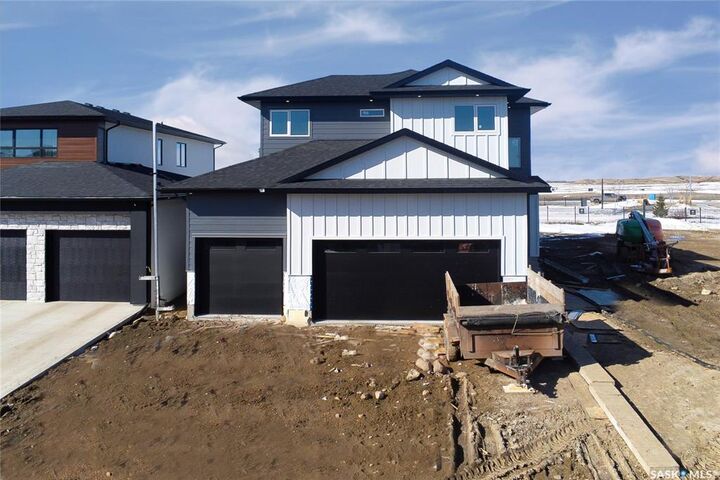Property Photo:  447 Woolf Bend  SK S7W 1E6 