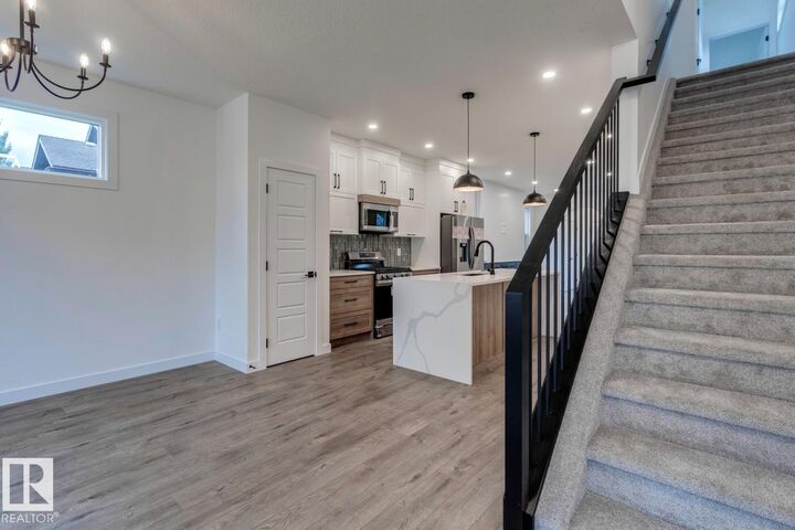 Property Photo:  11336 130 Street NW  AB T5M 1A2 
