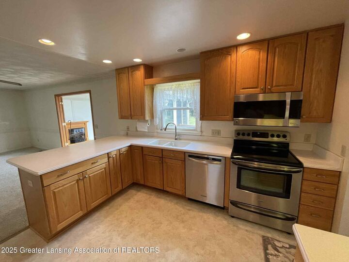 Property Photo:  13955 Ducharme Drive  MI 48820 